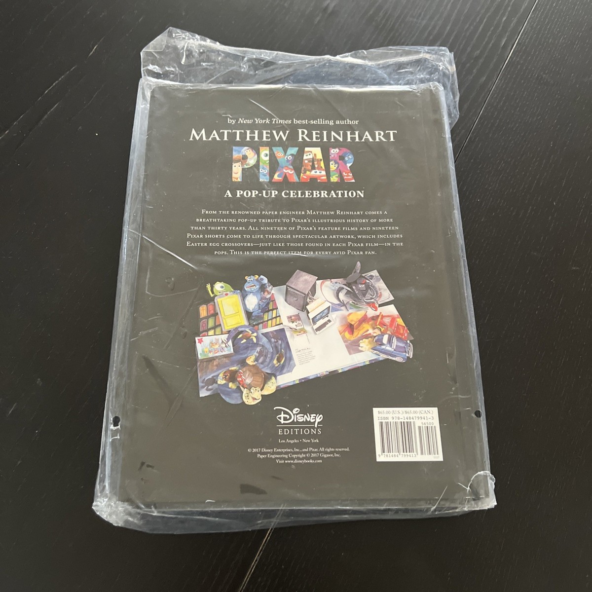 Disney*Pixar : A Pop-Up Celebration by Matthew Reinhart (2017