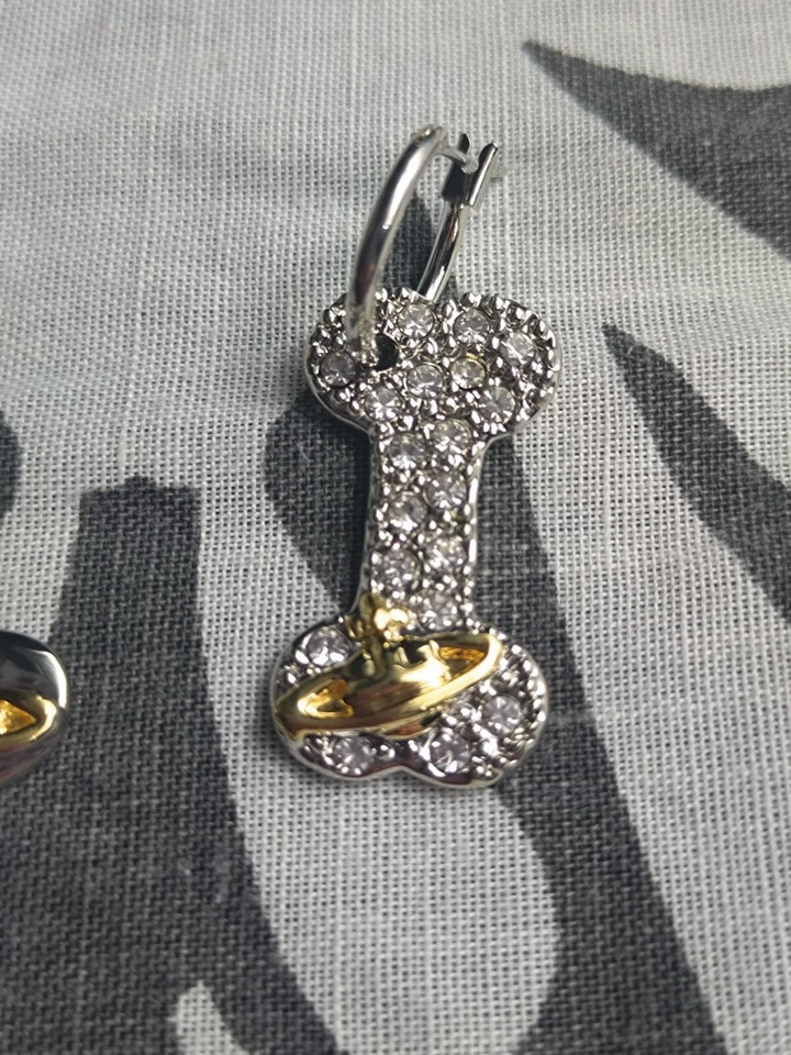 Pendientes colgantes Vivienne Westwood plata hueso cristal oro orbe Foto 2 de 4