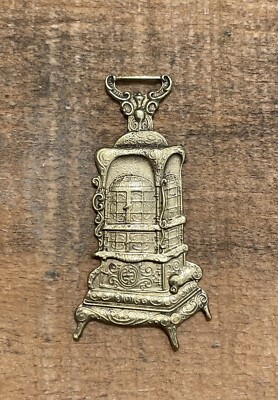 Antique Embossed Germer Stove Co Ranges  & Furnaces Advertising Watch Fob