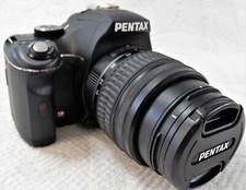 Pentax K-x Digital SLR with 2.7-inch LCD and 18-55mm f/3.5-5.6 AL Lens Black 