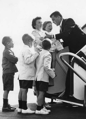 Representative John T Driscoll helps family board a plane July 10 1960 Old Photo