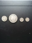 One 1881 Morgan Silver Dollars,, Walking Liberty Quarter,, 1939 &  1945 Mercury