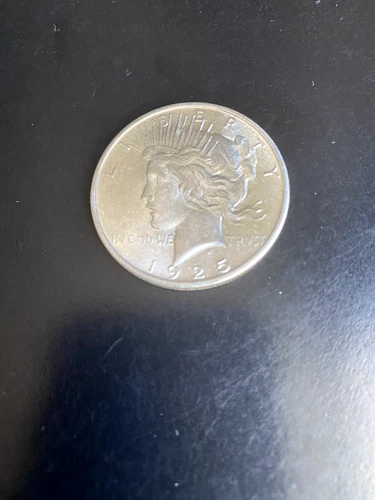 1925 SILVER PEACE DOLLAR, PHILADELPHIA MINT.NICE UNCIRCULATED COIN. #1