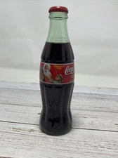 Coca-Cola Classic Limited Edition 1999 Christmas Santa w/ girl 8oz bottle Sealed