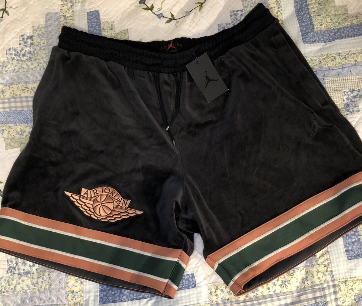 jordan shorts black and gold