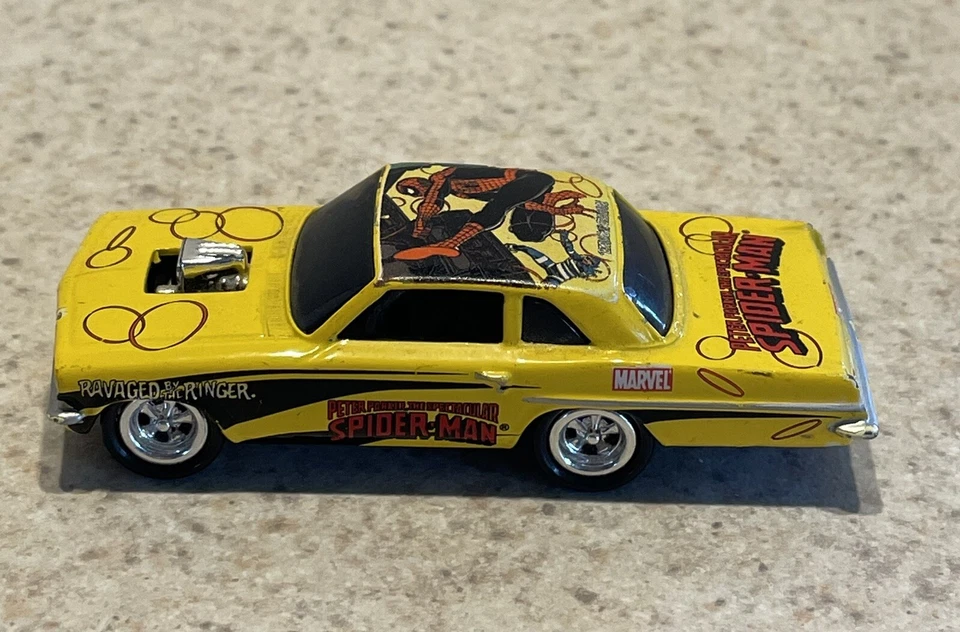 Pontiac Tempest 2004 Johnny Lightning Peter Parker Spectacular Spiderman 1963 - Изображение 3 из 4