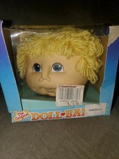 The Original Doll Baby Doll Head blonde long loops hair NOS.