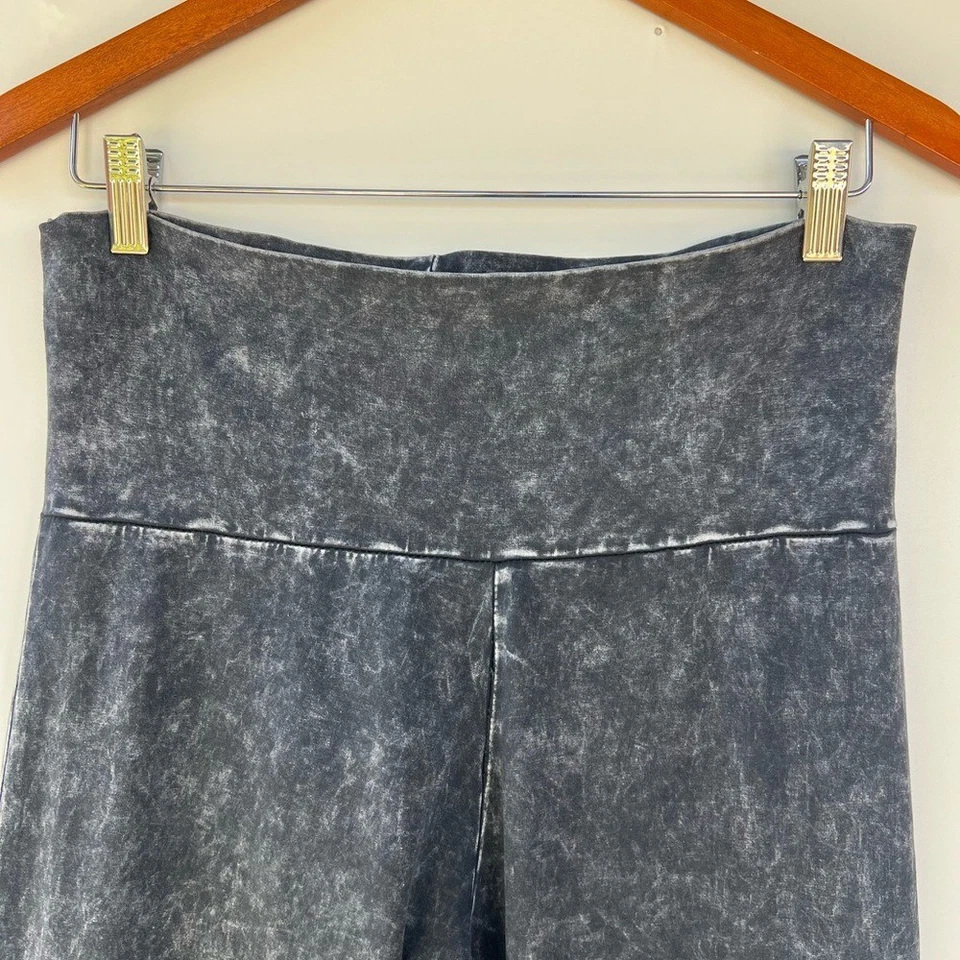 Pantalones acampanados con flecos negros talla L T Party para mujer Foto 2 de 4