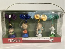 NIB SET OF 4 PEANUTS SNOOPY JINGLE BUDDIES JINGLE BELL PENDANTS NECKLACES
