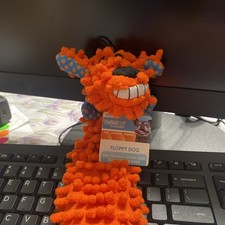 Floppy Loofa Plush Stuffing Free Squeaking Dog Toy