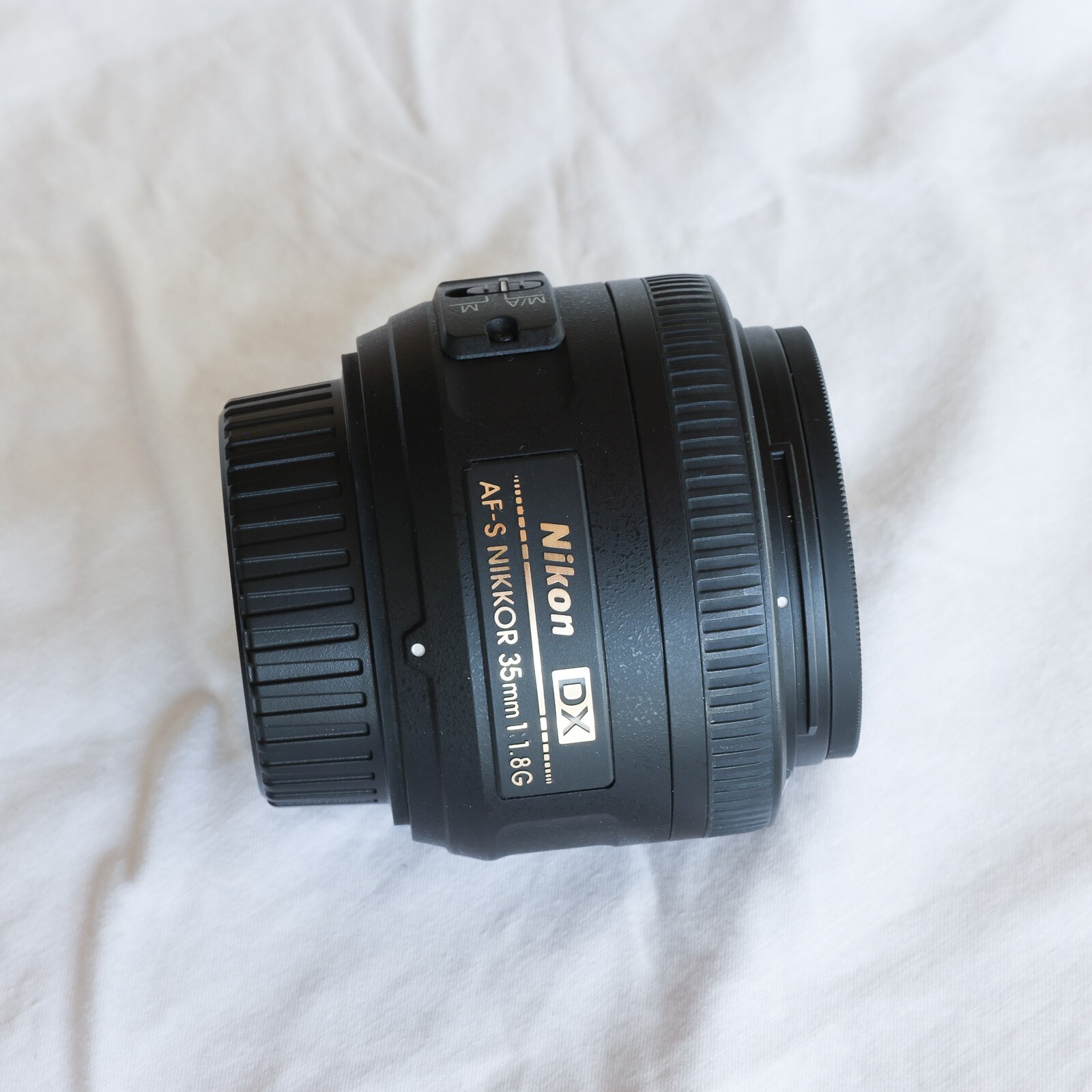 Nikkor 35 mm F/1.8G AFS DX Lens with UV filter for Nikon cameras