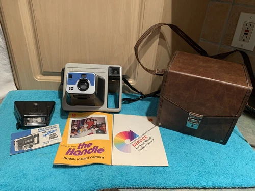 Kodak Instant Camera The Handle with ITT Magic Flash EF-242 W/book And Case