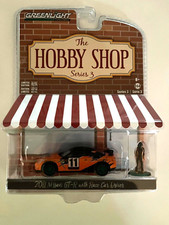 GREENLIGHT 'THE HOBBY SHOP' SERIES 3 2011 NISSAN GT-R WITH CAR DRIVER CHASE