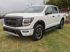 Touch Up Paint for Nissan Titan with paint code QAK, Glacier White.