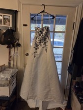 David's bridal Gothic T8763R black and white embroidered wedding dress.
