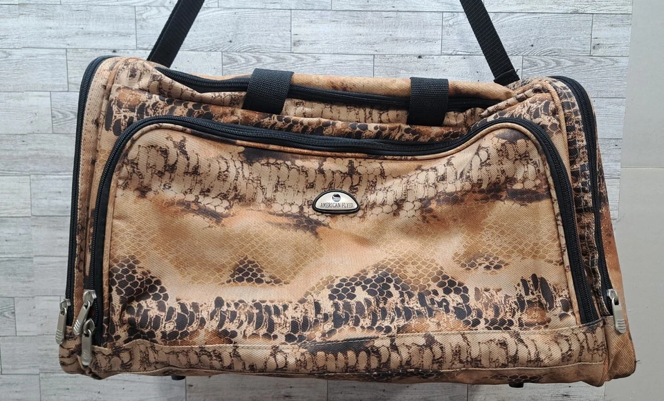 Equipaje American Flyer 20x12 marrón estampado de serpiente lona bolso de lona aspecto pintado Foto 2 de 4
