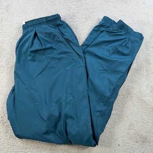 blue nike windbreaker pants