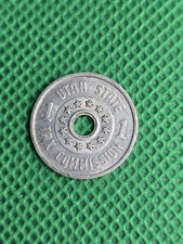 1937–1942 Utah aluminum sales tax token, valued at 1 mill (1/10 cent).