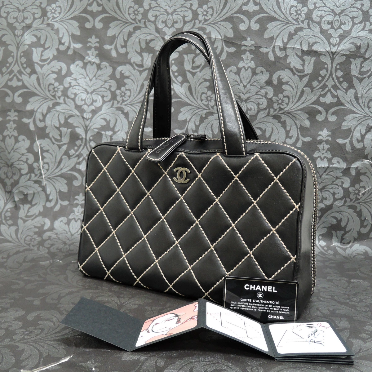 chanel quilted frame bag