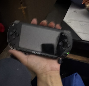 Sony PSP Handheld Black, All chords and a battery. Used a few times
