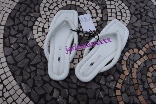 white quilted platform sandals