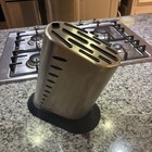 Global Knife Block  used.    NO KNIVES INCLUDED   