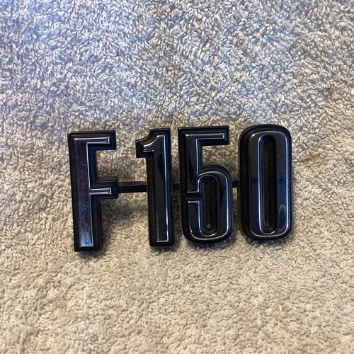 NOS 1975 Ford F150 Fender Emblem D5TB-16702-AA 1976 W/nuts - Picture 1 of 11