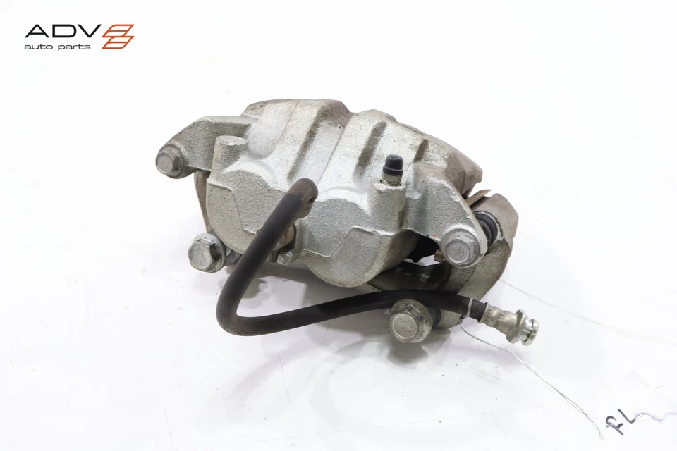 Pinza de freno delantera izquierda Nissan Frontier 2008-2025 OEM Foto 3 de 4