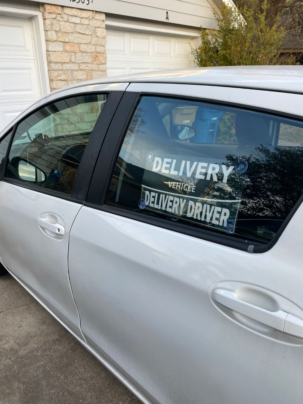 delivery driver car sign