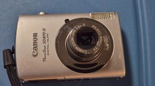 Canon PowerShot ELPH SD870 IS Digital ELPH Camera. Works. Spot on rear display