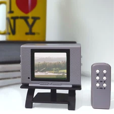 Tiny TV Classics Collectible TV with Real Working Remote (Jurassic Park)