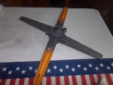 WHIRLPOOL DISHWASHER SPRAY ARM AS PICTURED. ORANGE ACCENTS.