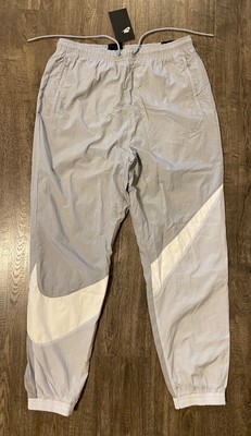 nike big swoosh woven pants