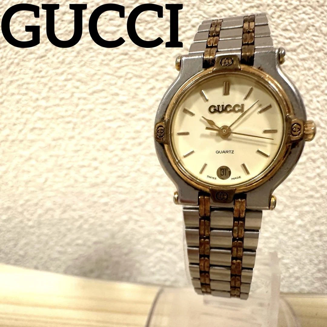 Montre GUCCI 9000L argent or neuve   pile avec boite vintage 