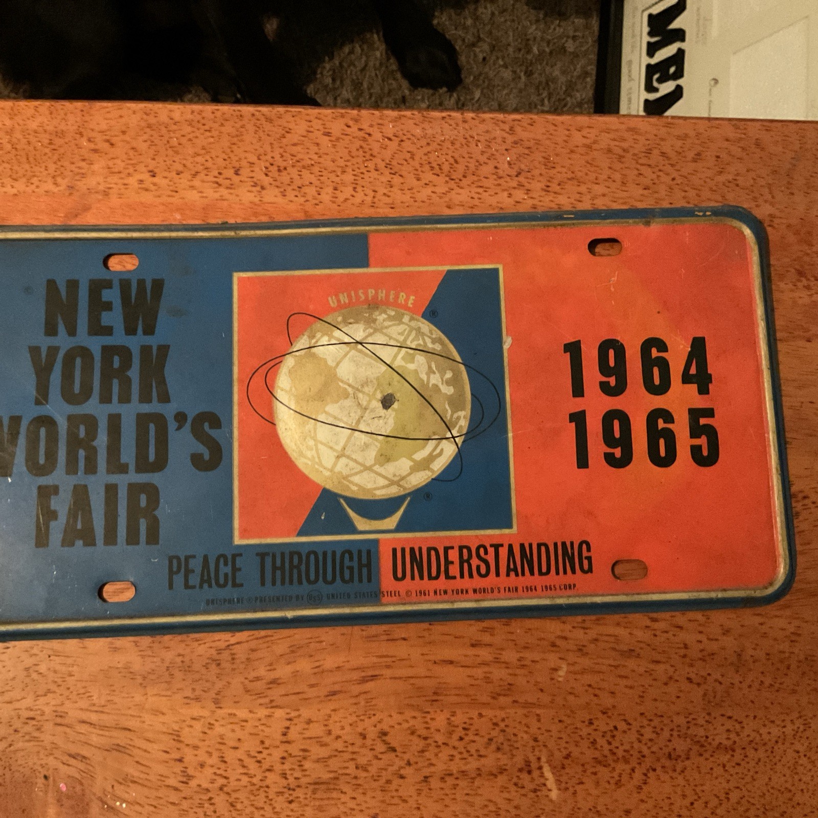 1964 New York World's Fair License Plate Unisphere Embossed Booster Plate 1965