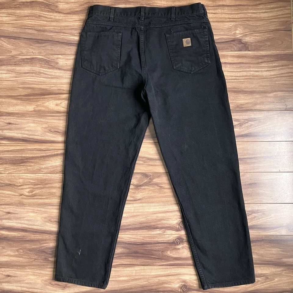 Pantalones de mezclilla vintage de algodón lavado oscuro relajados negros 40x36 Carhartt Jeans para hombre Foto 3 de 4