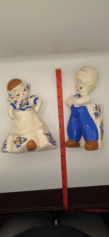 Vintage blue and white , dutch boy and girl floral vases