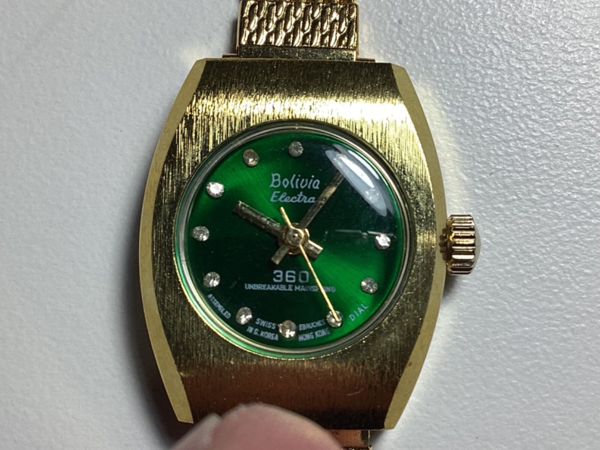 Bolivia Electra 360 Rare Vintage Mechanical Ladies Watch Gold Dial Bracelet Bolivia 360 Electra all Gold Tone Watch has a black... | Depop main image 4