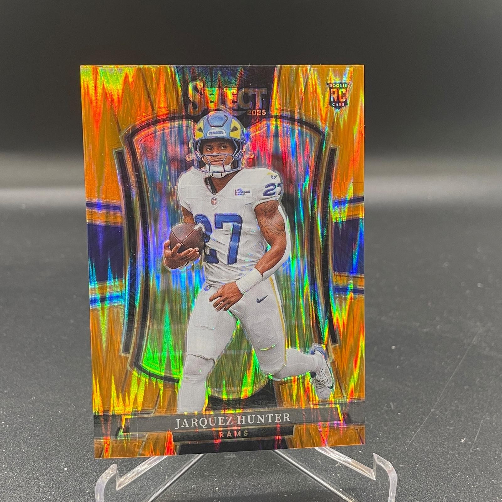 Jarquez Hunter 2025 Select Orange Prizm Shock 119 #/399 Los Angeles Rams RC