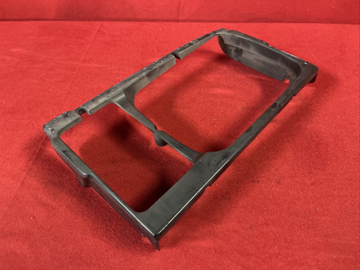 1984-1986 Nissan 300ZX Z31 2+0 Turbo Left Driver HEADLIGHT TRIM