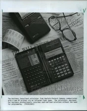 1987 Press Photo Business Consultant Calculator from Hewlett-Packard Company
