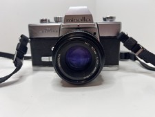 Minolta SRT 201 Black Silver SLR Film Camera with MD 50mm f/1.7 Lens