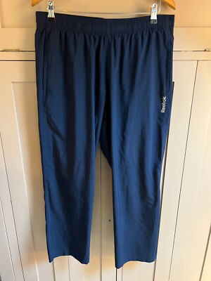 Reebok Elements Speedwick men's woven tracksuit bottoms in blue