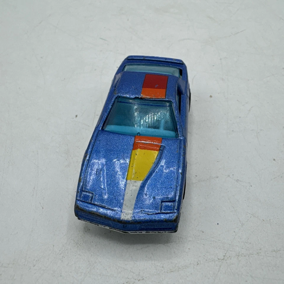 Matchbox Pontiac Firebird SE suelto 1:62 ruedas láser vintage 1982 azul Macao Foto 2 de 4