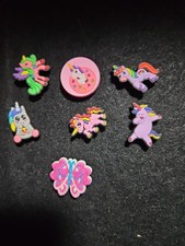 Lot Of 6 Unicorn Themed Jibbitz Shoe Charms For Crocs and one butterfly.