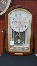 SEIKO QXM123BRH Melodies In Motion Musical Wall Clock Dropping Dial