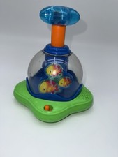 Bright Starts Press & Glow Spinner Baby Toy Lights and Sound Developmental