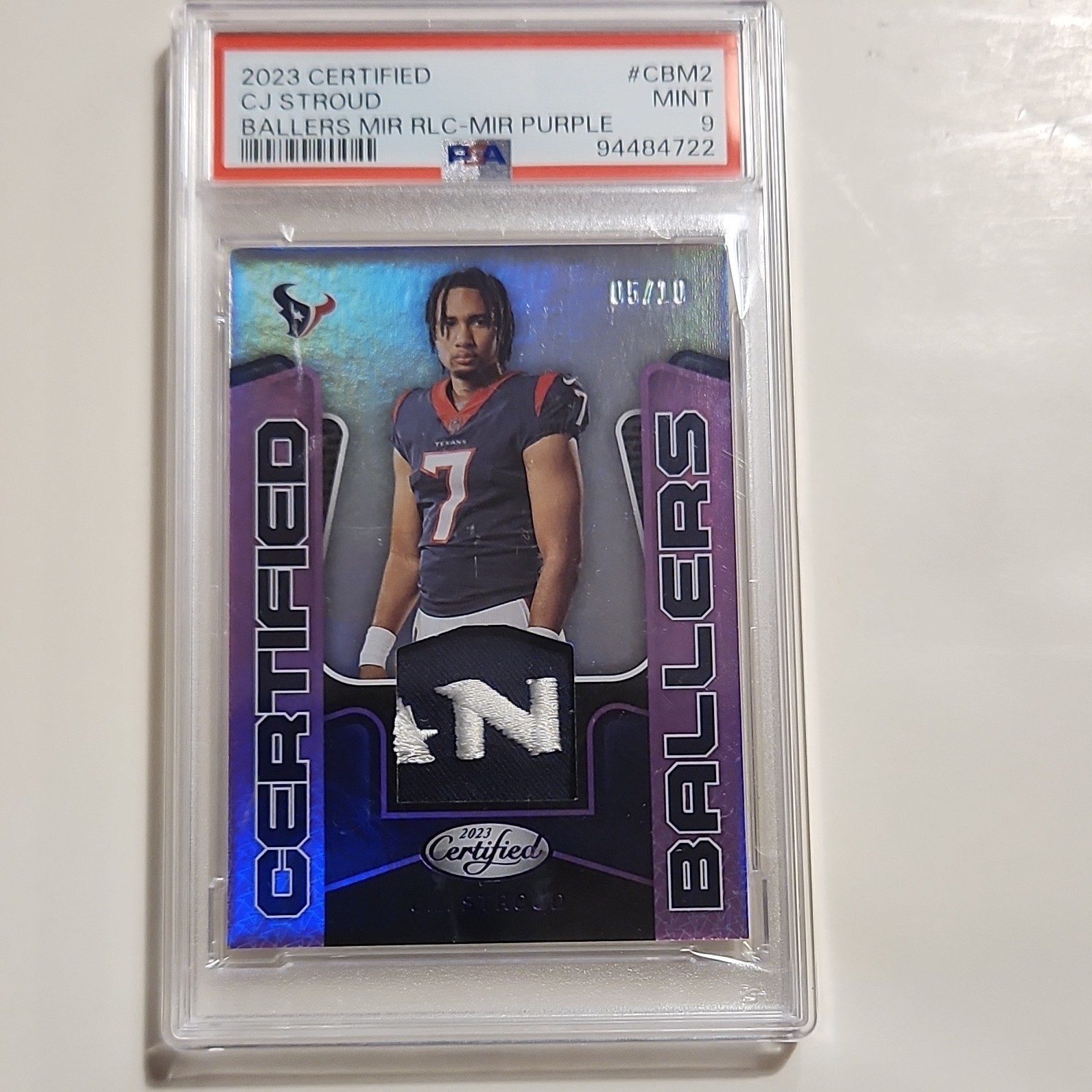 2023 Panini Certified Ballers C.J. Stroud Rookie Mirror Purple 5/10 PSA Mint 9
