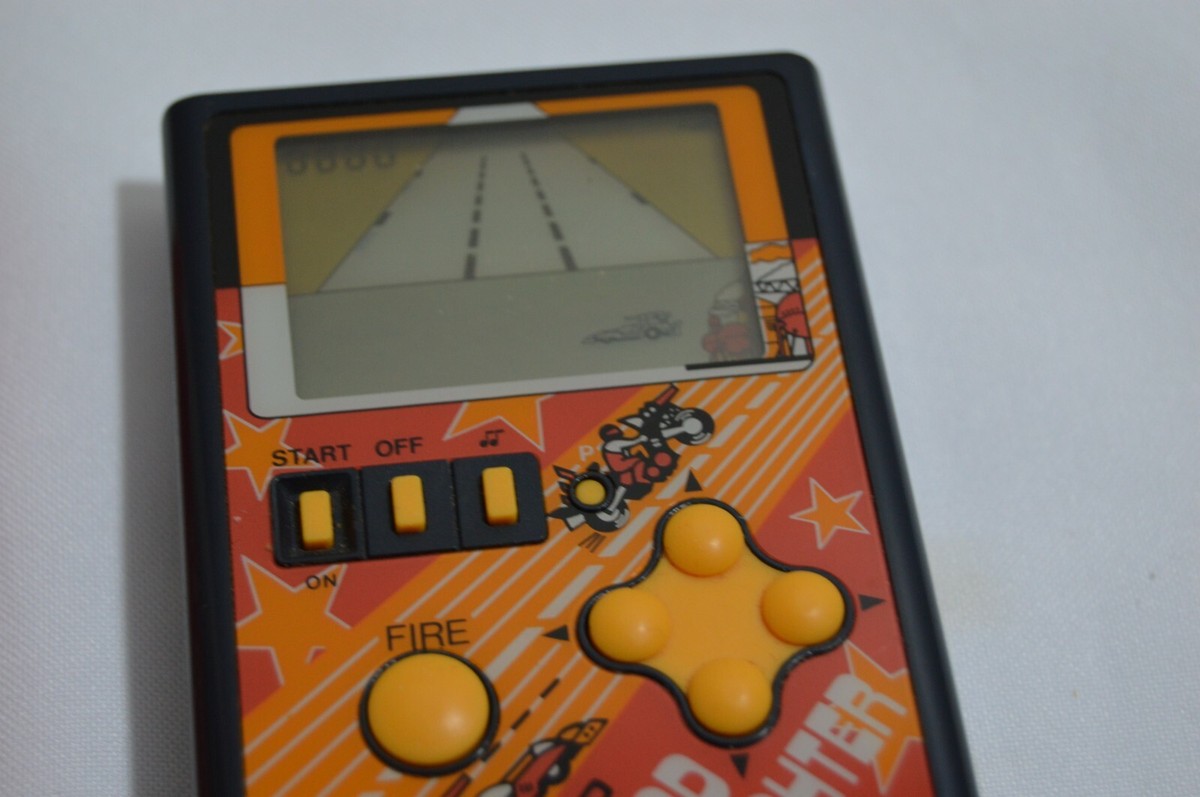 RARE VINTAGE 1984 CASIO CG-84 MAD FIGHTER ELECTRONIC HANDHELD GAME