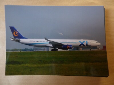 XL.COM AIRBUS A 330-343X CS-TRH / Schurkensammlung Nr. 716